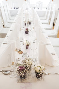 Floral wedding long table bouquets
